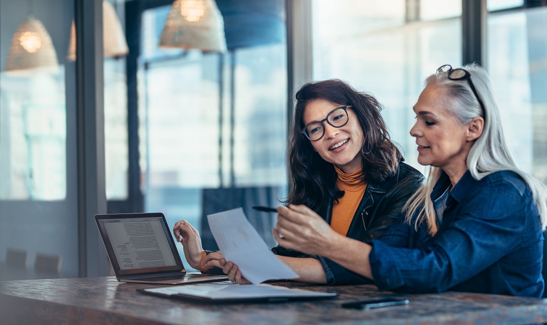 Businesswomen Analyzing